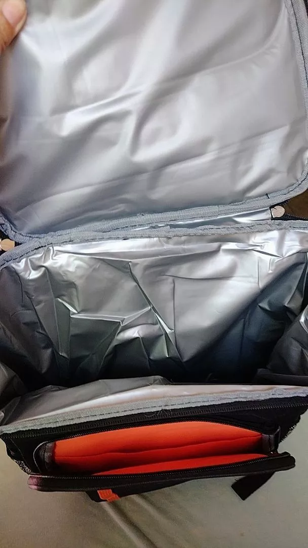 Foto de Eduardo T. com a mochila térmica cooler 23L
